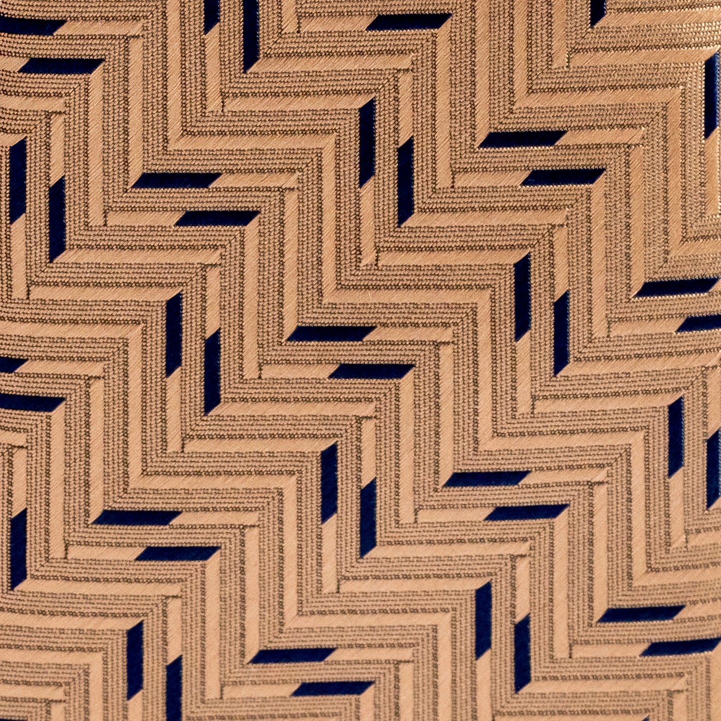 Geometric patterned fabric with blue and brown tones