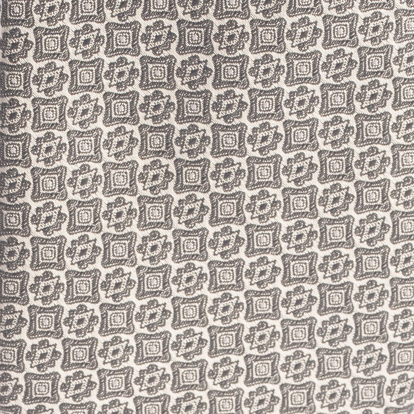 Patterned fabric with geometric design on a beige background