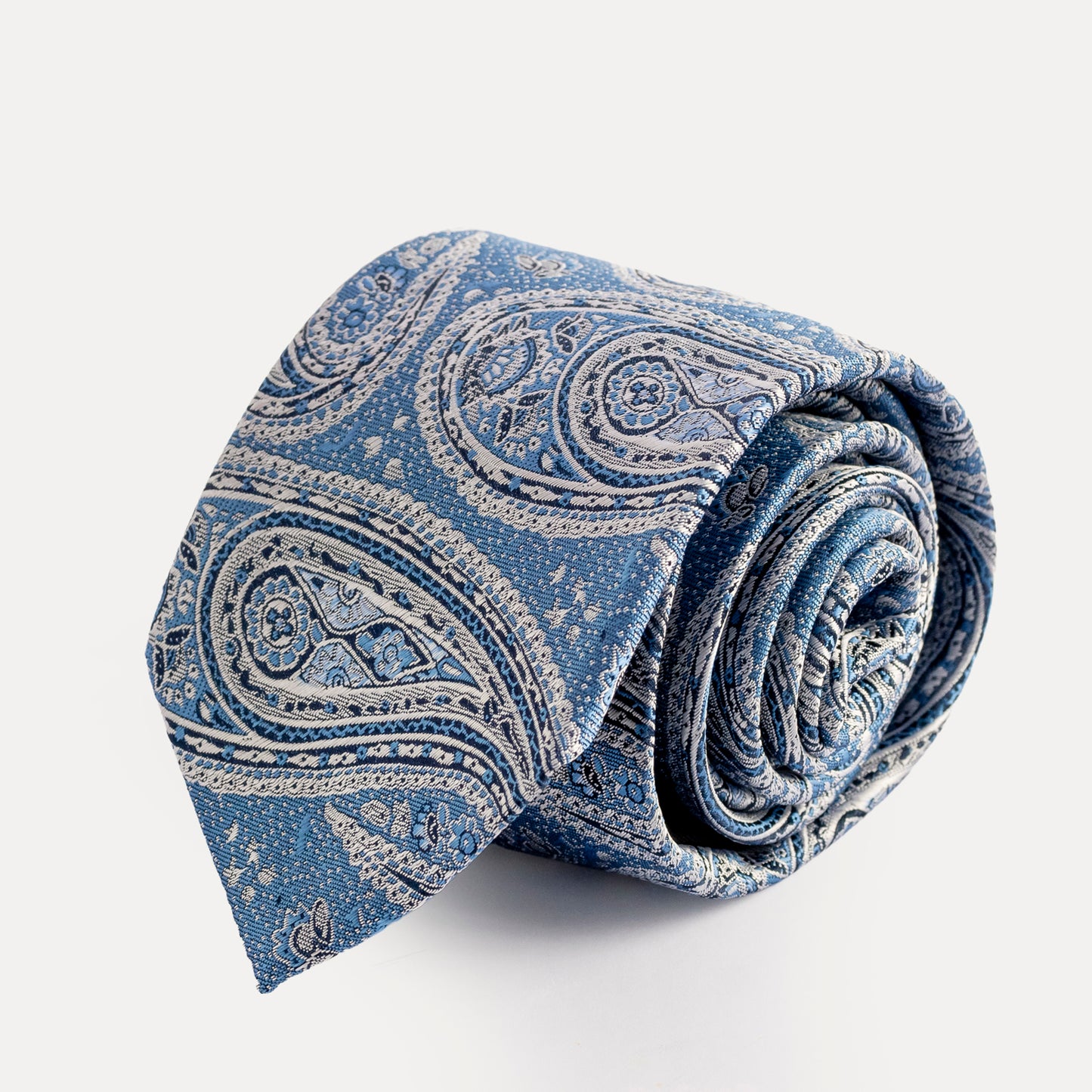 Blue paisley tie on a white background