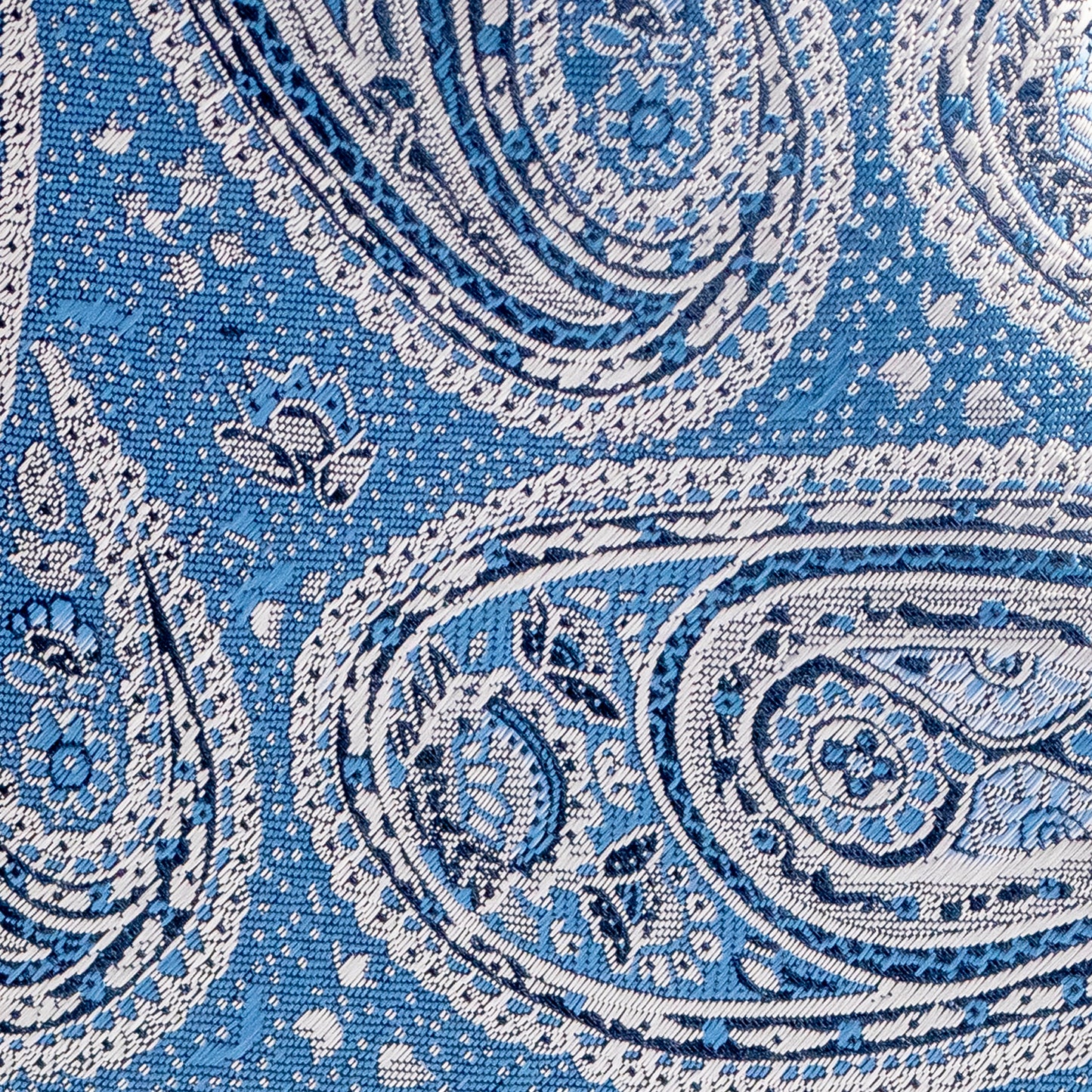Close-up of a blue and white paisley patterned fabric