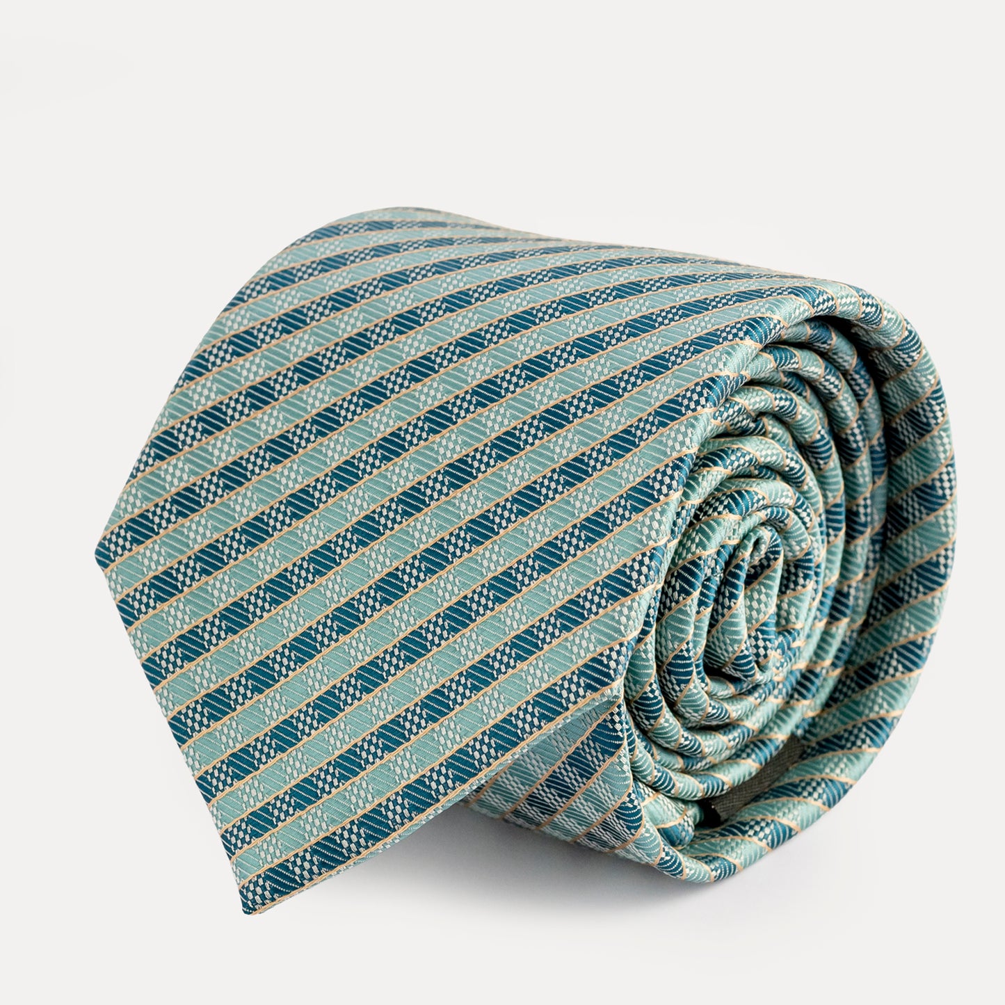 Rolled-up striped tie on a light gray background