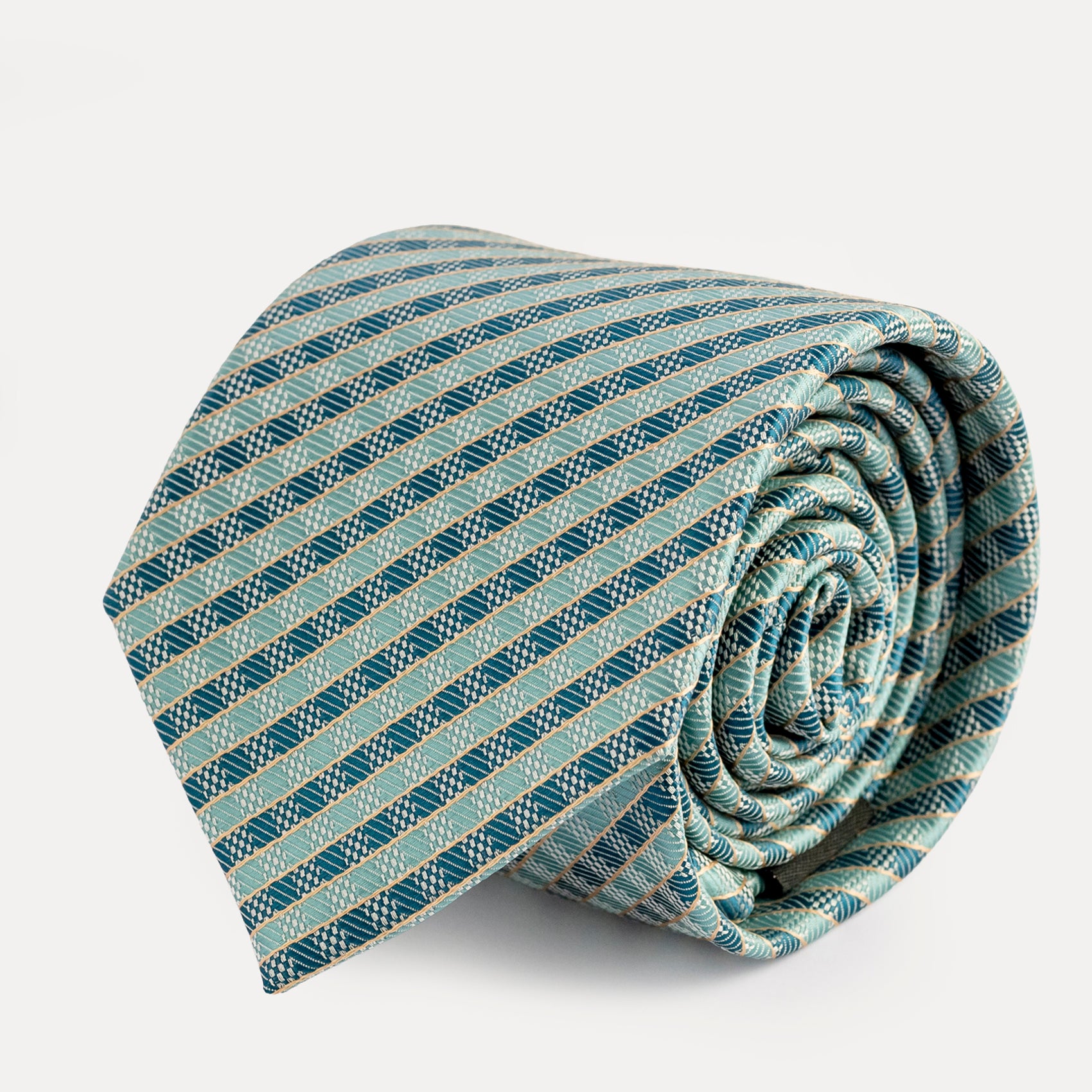 Rolled-up striped tie on a light gray background