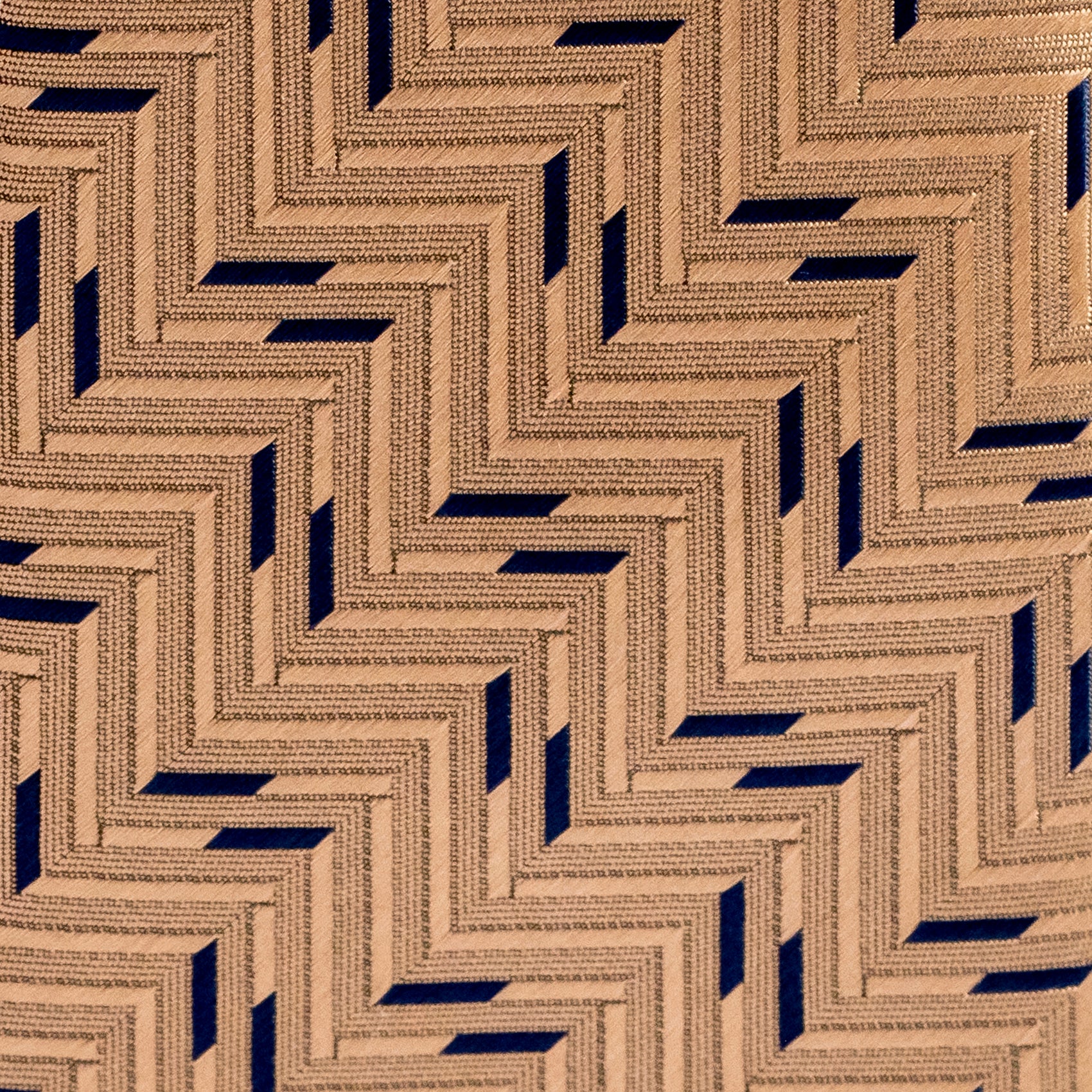 Geometric patterned fabric with blue and brown tones