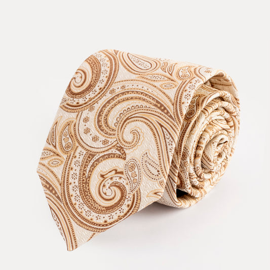 Beige paisley patterned tie on a white background