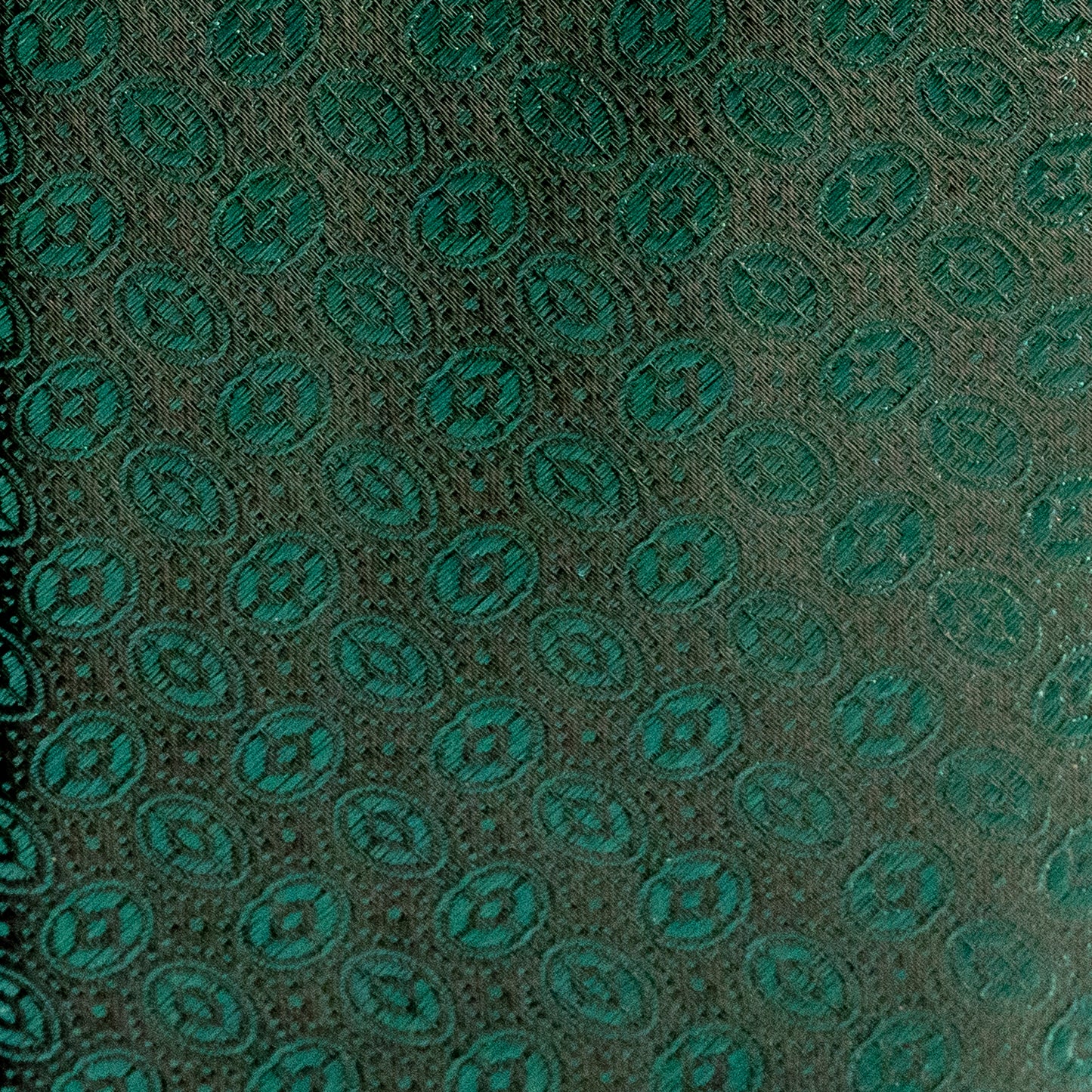 Patterned fabric with green and gray design