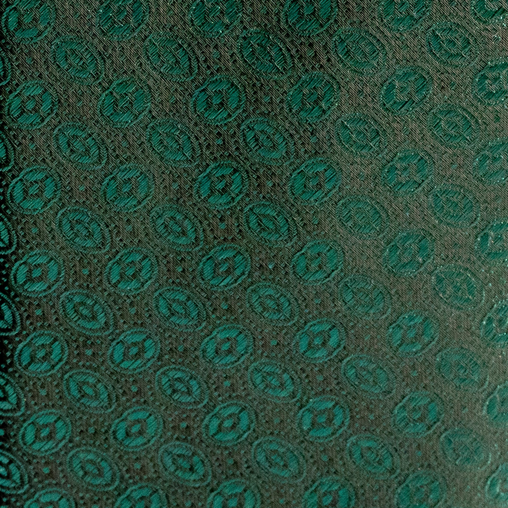 Patterned fabric with green and gray design