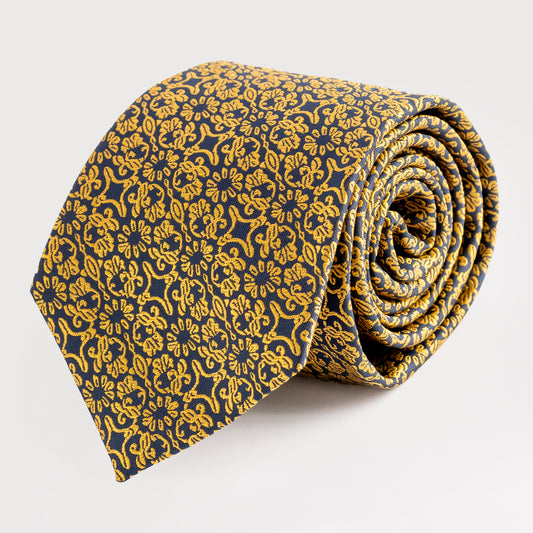 Roll of yellow patterned fabric on a white background