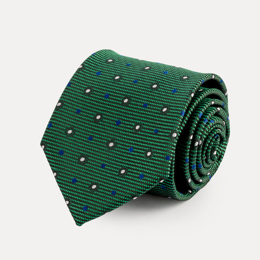 Green tie with small pattern on a light gray background