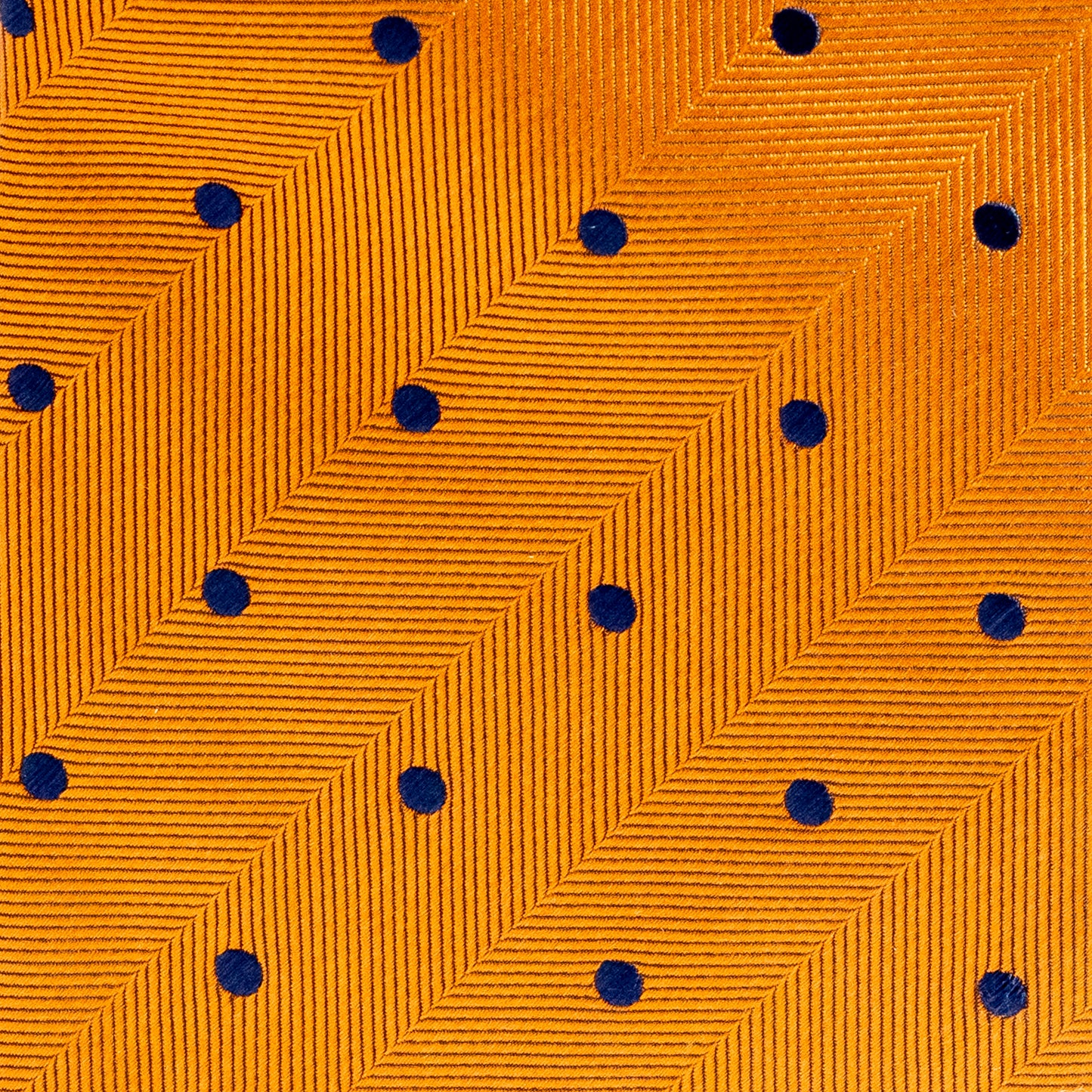 Patterned fabric with blue dots on a yellow background