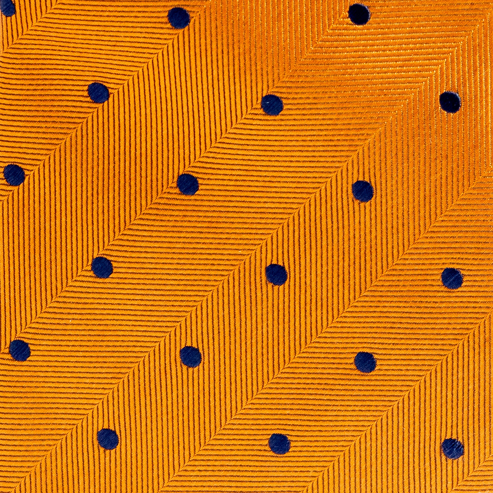 Patterned fabric with blue dots on a yellow background