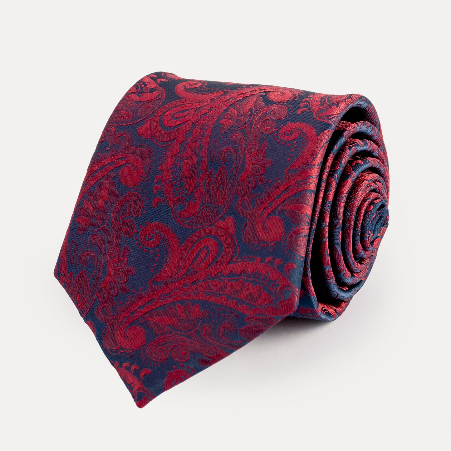 Red paisley tie on a white background