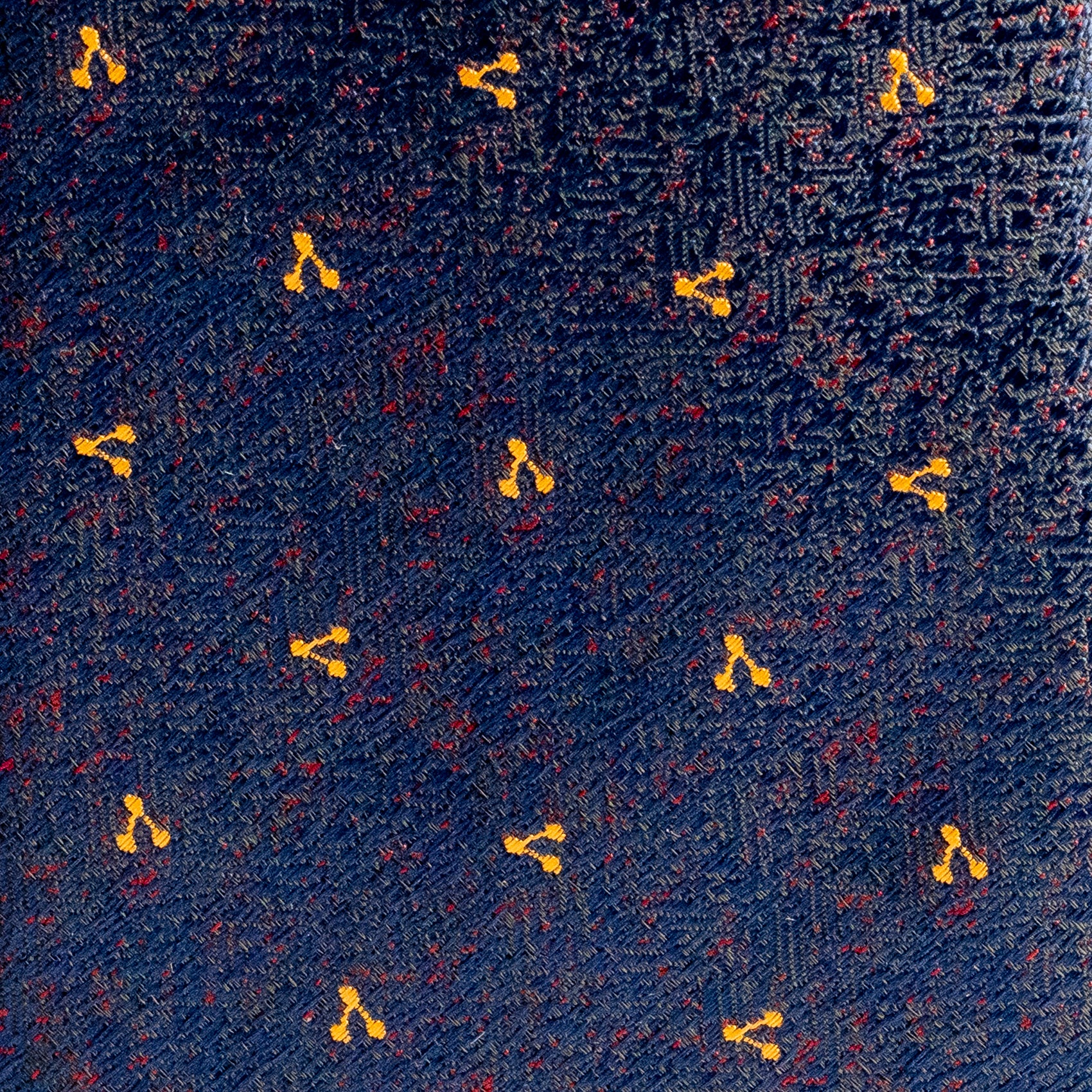 Navy fabric with small yellow floral patterns