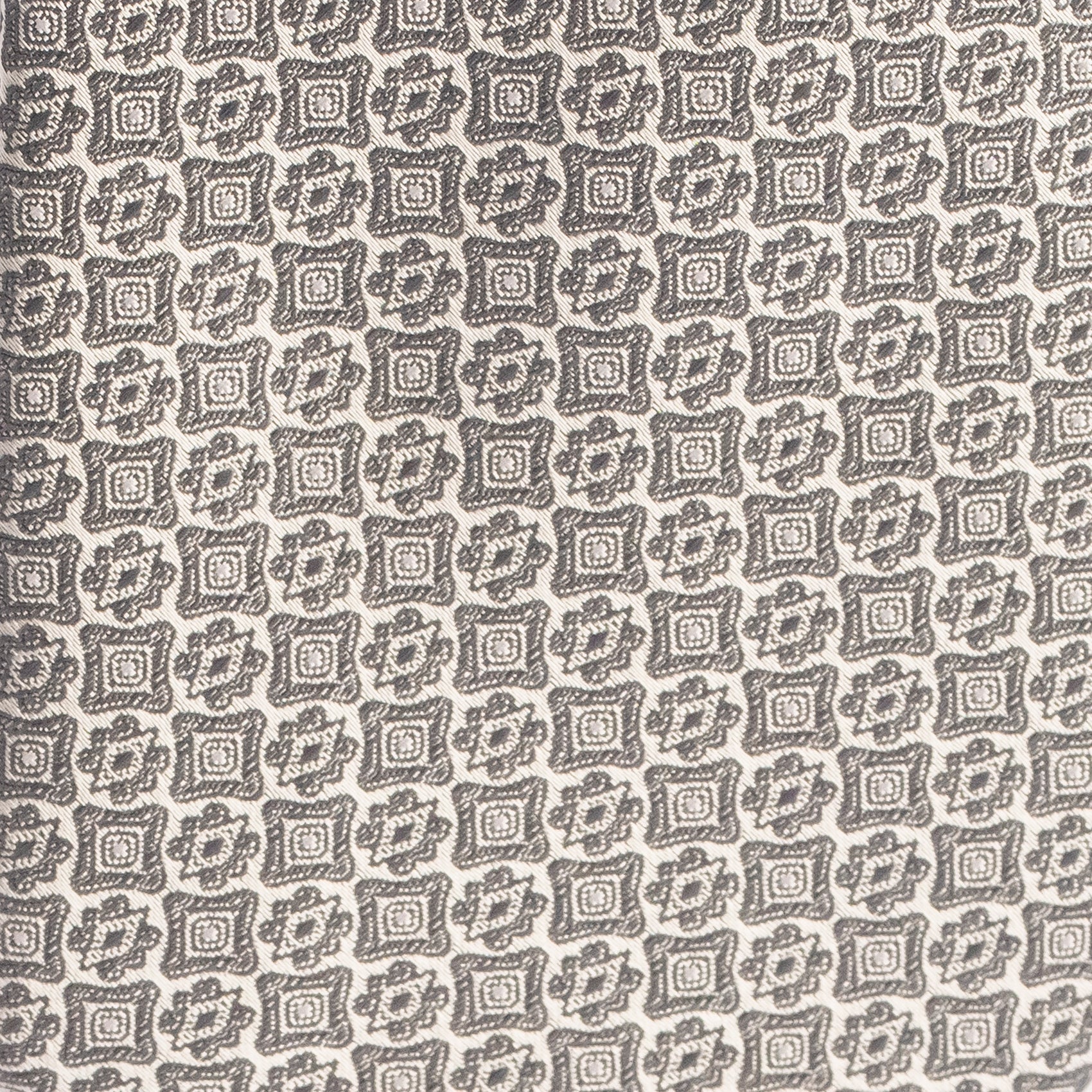 Patterned fabric with geometric design on a beige background