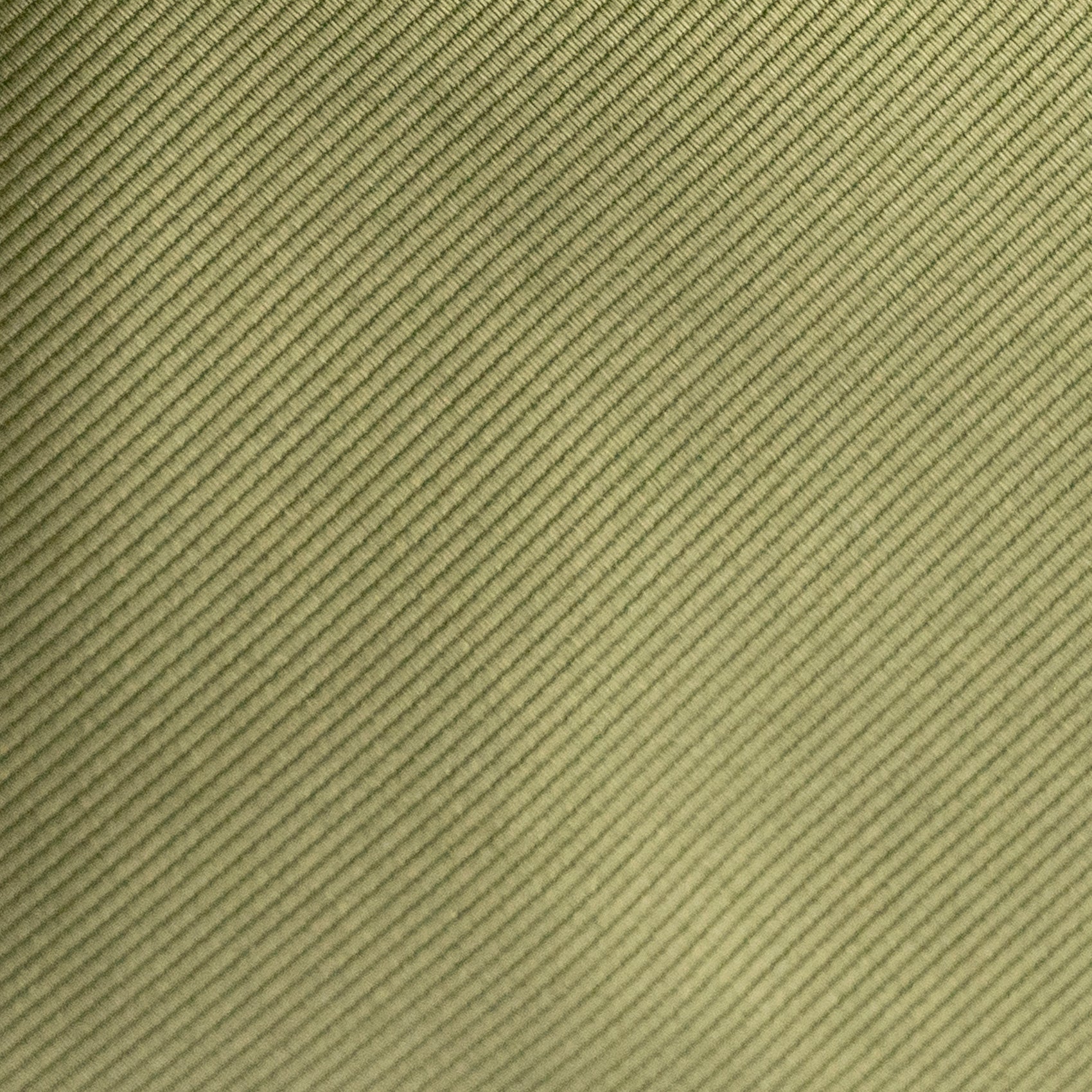 Textured green fabric pattern