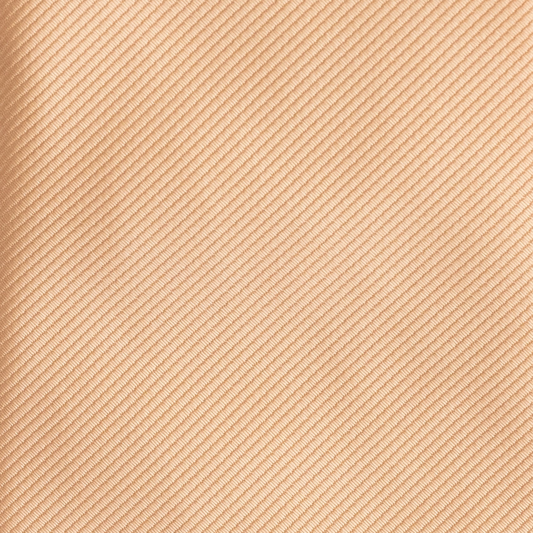 Beige fabric texture with a subtle diagonal pattern