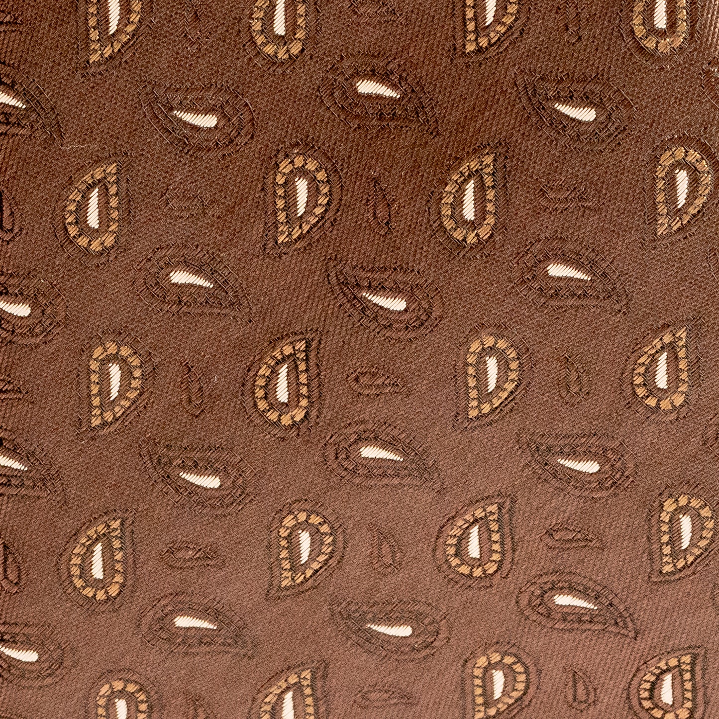 Close-up of brown fabric with a subtle pattern